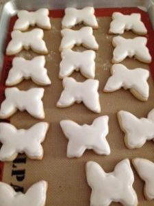 Here's an alt tag for the image: `Frosted butterfly-shaped sugar cookies`