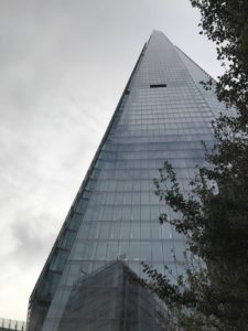 A tall building with a sky background