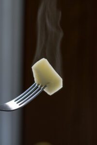 A fork with some food on it